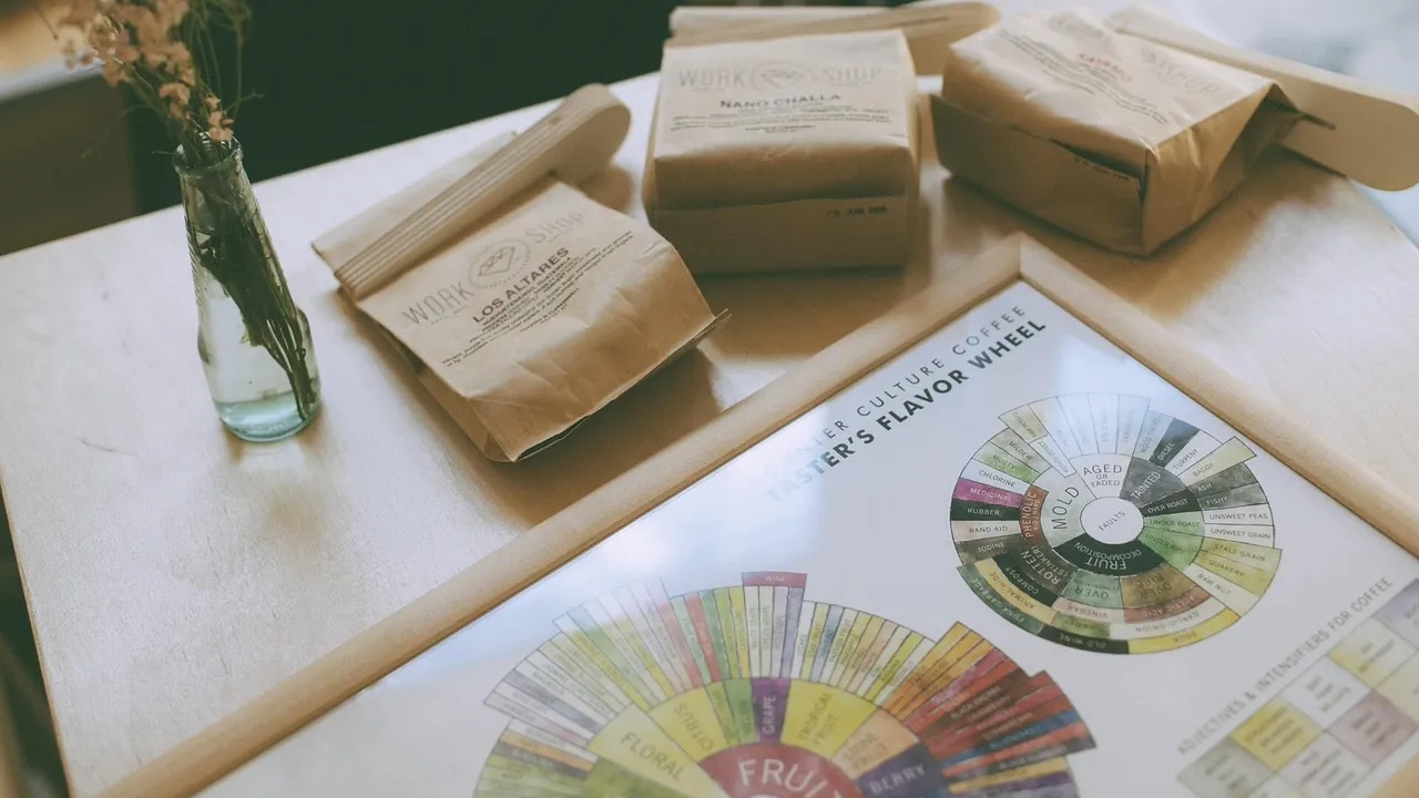 Close up on a plate of mashed potatoes, topped with baked pork chops with cream of mushroom soup, and a side of green beans.