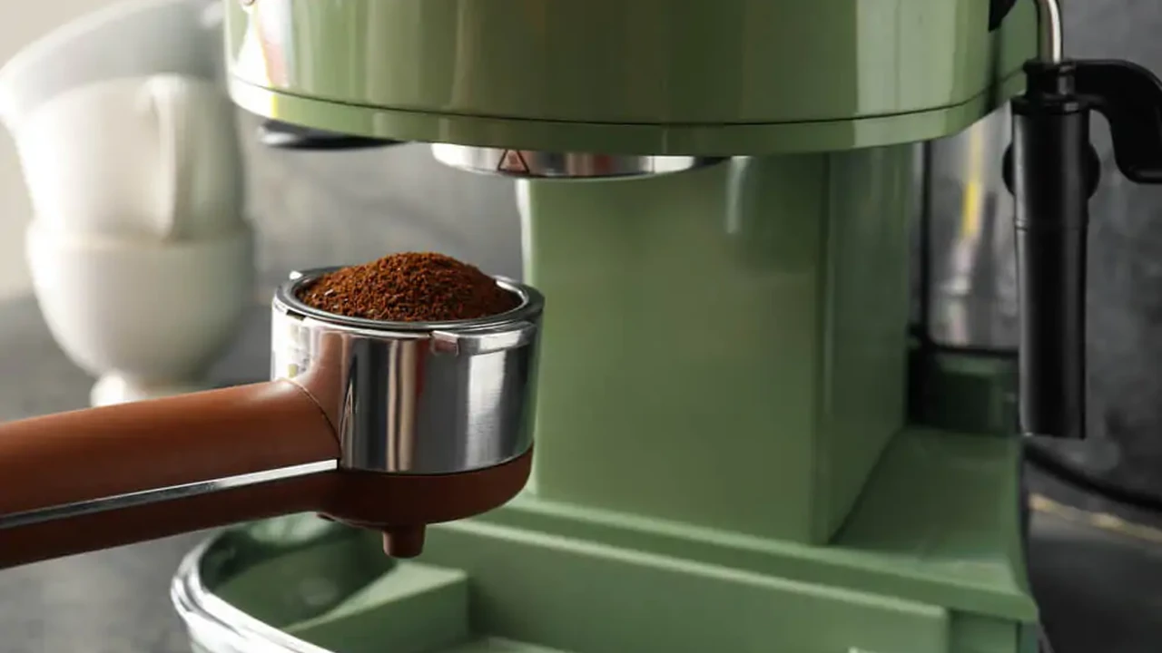 Close up on a plate of mashed potatoes, topped with baked pork chops with cream of mushroom soup, and a side of green beans.