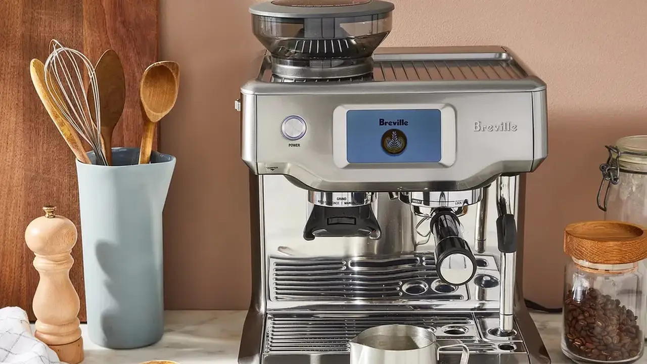 Close up on a plate of mashed potatoes, topped with baked pork chops with cream of mushroom soup, and a side of green beans.