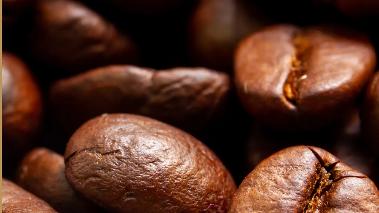 overhead view of corned beef sliced and on a platter with cabbage, potatoes, and carrots